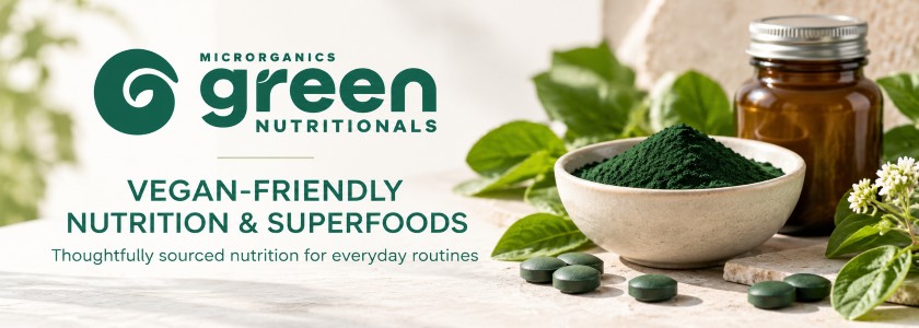 Green Nutritionals vegan-friendly nutrition and superfoods banner with spirulina powder, tablets and botanical greens.